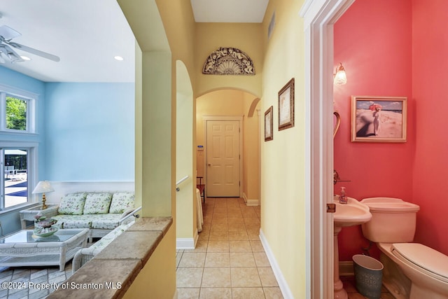 hallway with light tile patterned floors