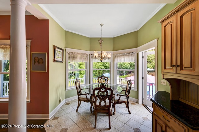 tiled dining room with ornate columns, an inviting chandelier, and ornamental molding