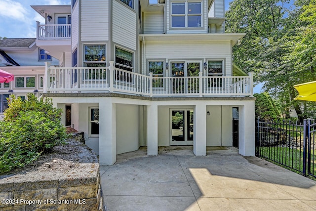 back of property with a patio area