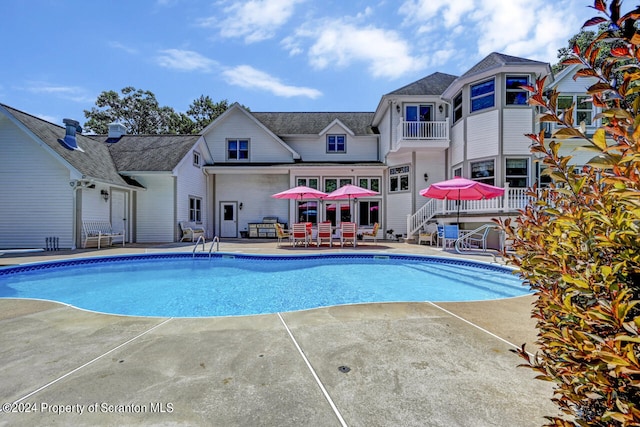 view of pool with a patio area