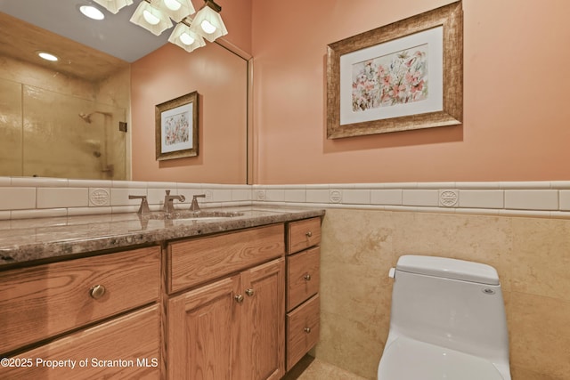 218 Weatherby St, Dalton, PA 18414 - full bathroom with walk in shower, toilet, tile walls, vanity, and wainscoting