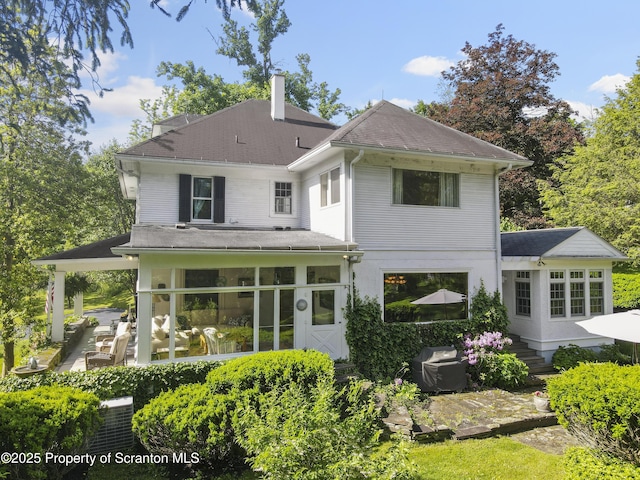 218 Weatherby St, Dalton, PA 18414 - rear view of property featuring roof with shingles and a patio area