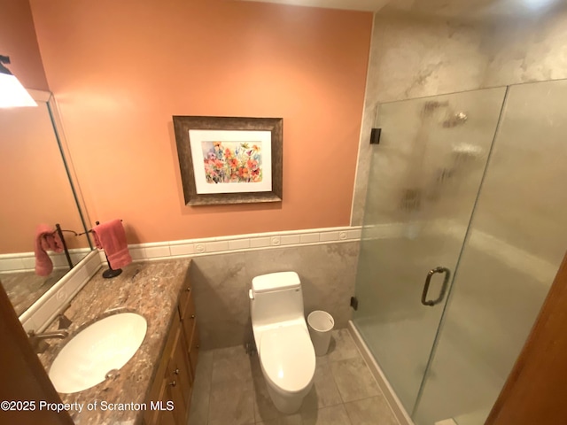 218 Weatherby St, Dalton, PA 18414 - full bath with tile walls, a stall shower, tile patterned flooring, vanity, and toilet