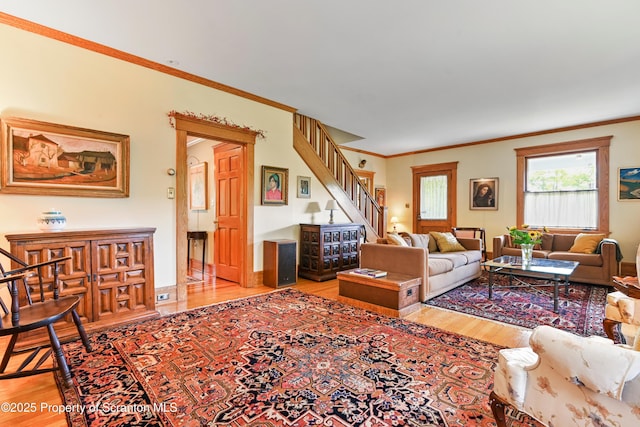218 Weatherby St, Dalton, PA 18414 - living room featuring wood finished floors, stairway, and crown molding