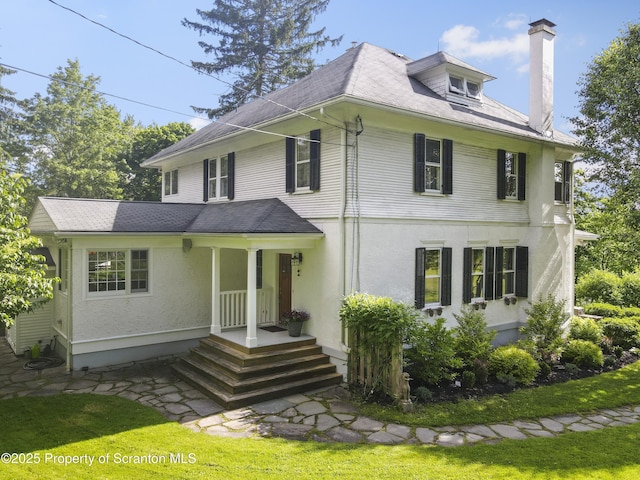 218 Weatherby St, Dalton, PA 18414 - view of front of property with stucco siding and a chimney
