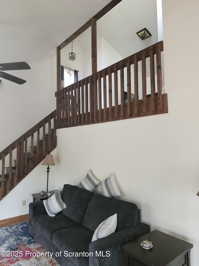 2258 Northgate Ct S Unit 16, Lake Ariel, PA 18436 - living area featuring a ceiling fan and stairway