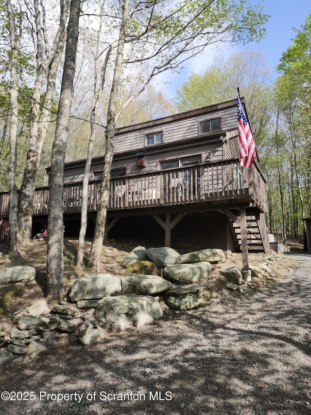 2258 Northgate Ct S Unit 16, Lake Ariel, PA 18436 - back of house featuring a deck and stairway