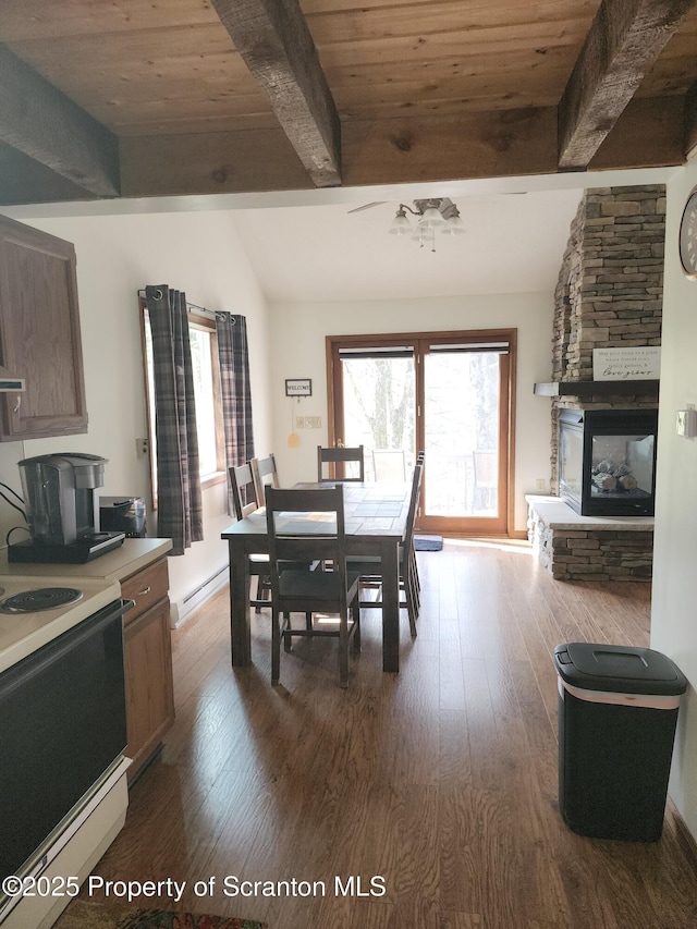 2258 Northgate Ct S Unit 16, Lake Ariel, PA 18436 - dining room featuring lofted ceiling with beams, dark wood-style flooring, a baseboard heating unit, and wooden ceiling
