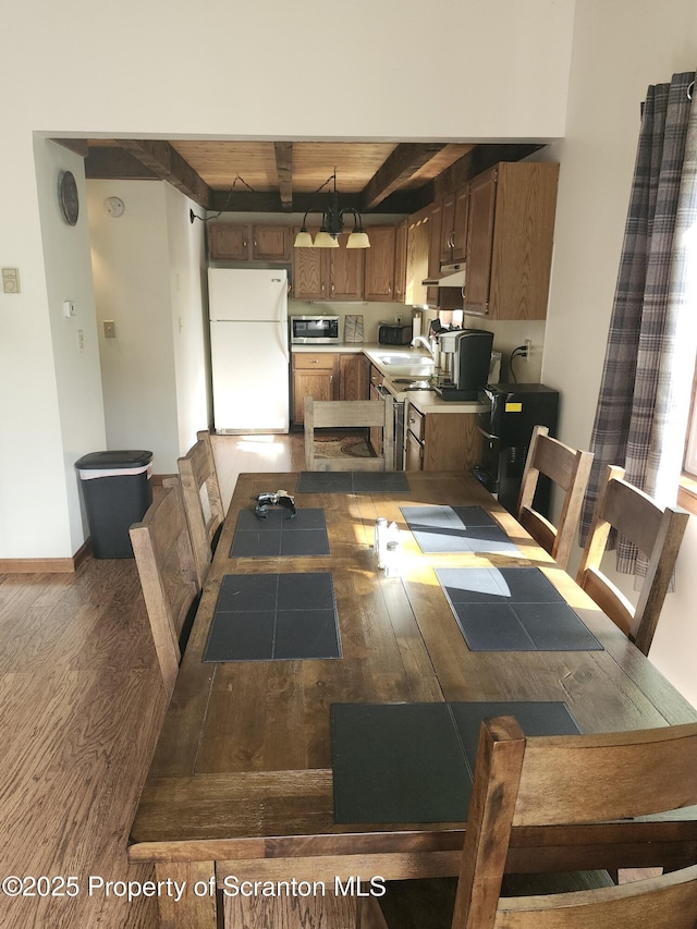 2258 Northgate Ct S Unit 16, Lake Ariel, PA 18436 - dining space with beamed ceiling and wood finished floors