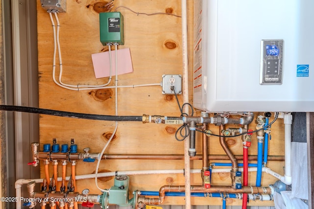 144 Crosstown Hwy, Union Dale, PA 18470 - utility room featuring tankless water heater