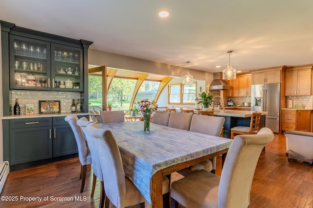 144 Crosstown Hwy, Union Dale, PA 18470 - dining area with dark wood-style flooring, recessed lighting, a baseboard heating unit, and a bar
