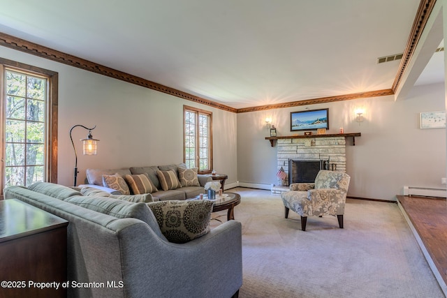 144 Crosstown Hwy, Union Dale, PA 18470 - living area with a stone fireplace, light carpet, and a baseboard radiator