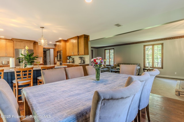 144 Crosstown Hwy, Union Dale, PA 18470 - dining area with recessed lighting, ornamental molding, dark wood-type flooring, and a baseboard radiator