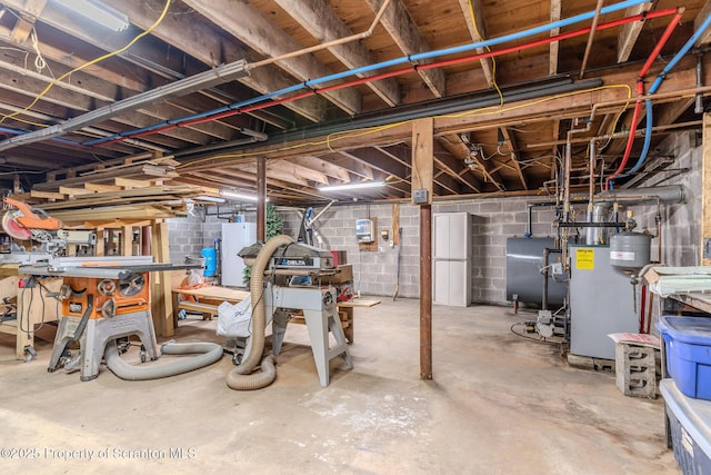 144 Crosstown Hwy, Union Dale, PA 18470 - unfinished basement featuring concrete block wall and oil tank
