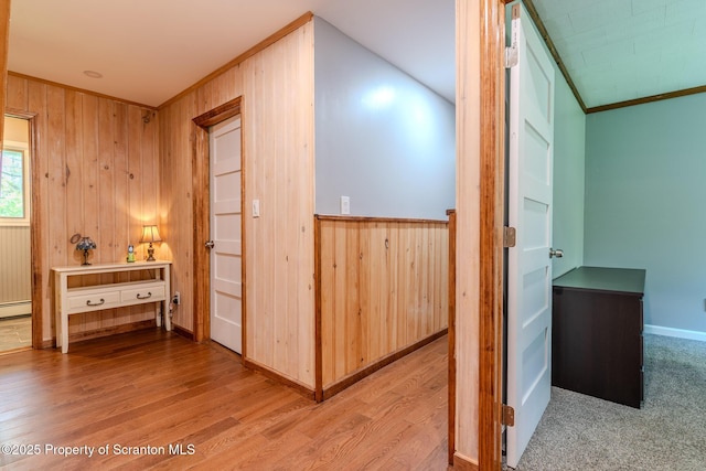 144 Crosstown Hwy, Union Dale, PA 18470 - corridor featuring wooden walls, wood finished floors, crown molding, and a baseboard heating unit
