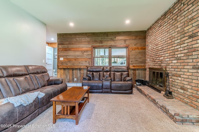 144 Crosstown Hwy, Union Dale, PA 18470 - living area featuring carpet, a fireplace, wood walls, recessed lighting, and a baseboard heating unit