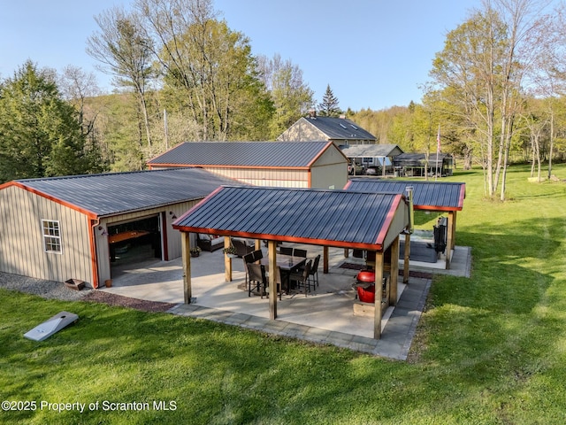 144 Crosstown Hwy, Union Dale, PA 18470 - surrounding community with a yard, an outdoor structure, and a patio area