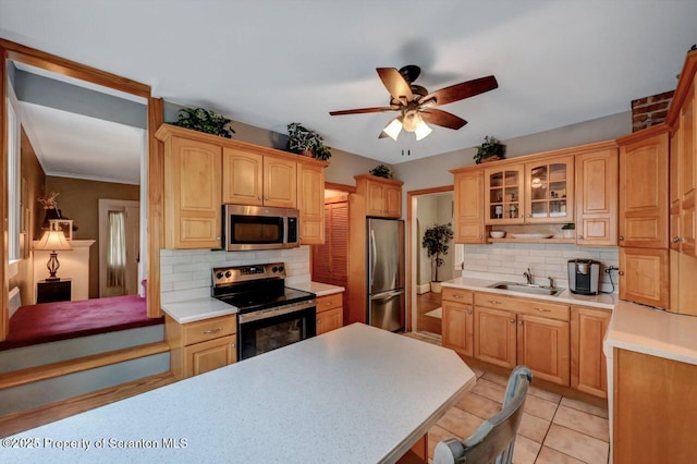 1120 Woodlawn St Unit L10, Scranton, PA 18509 - kitchen with appliances with stainless steel finishes, a sink, tasteful backsplash, and light countertops