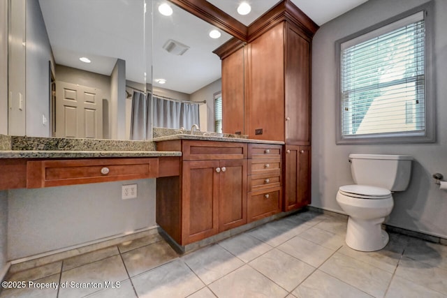 1120 Woodlawn St Unit L10, Scranton, PA 18509 - full bathroom featuring vanity, tile patterned flooring, toilet, and a shower with curtain
