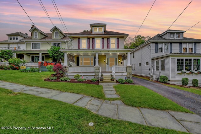1120 Woodlawn St Unit L10, Scranton, PA 18509 - american foursquare style home featuring a porch, a yard, and driveway