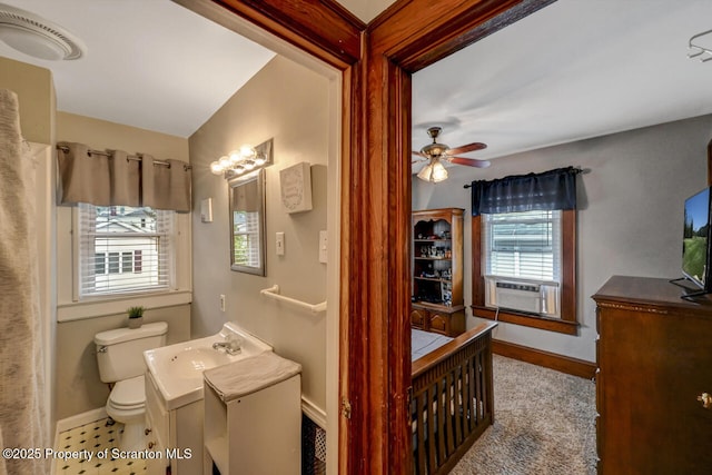 1120 Woodlawn St Unit L10, Scranton, PA 18509 - full bathroom featuring baseboards, toilet, vanity, a ceiling fan, and cooling unit