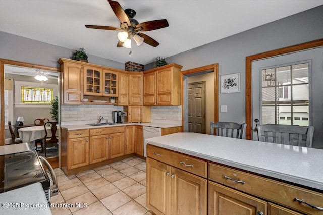 1120 Woodlawn St Unit L10, Scranton, PA 18509 - kitchen with ceiling fan, electric stove, light countertops, and tasteful backsplash