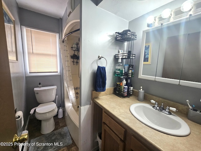 full bath featuring toilet, vanity, and shower / bathtub combination with curtain