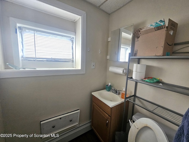 bathroom with toilet and vanity