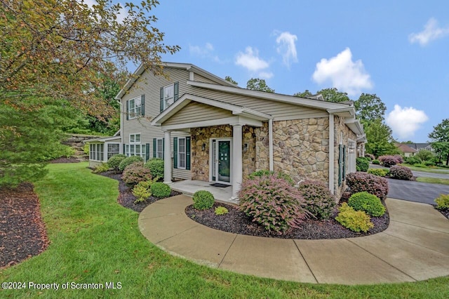 view of front of house with a front yard