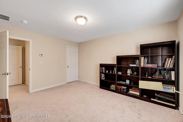 misc room with light colored carpet