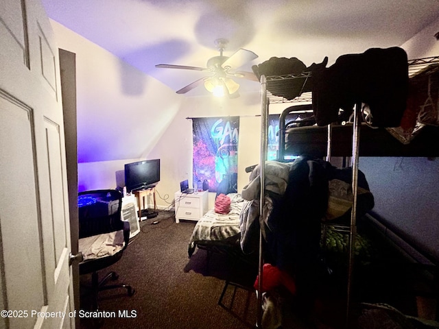 bedroom with lofted ceiling, carpet floors, and ceiling fan