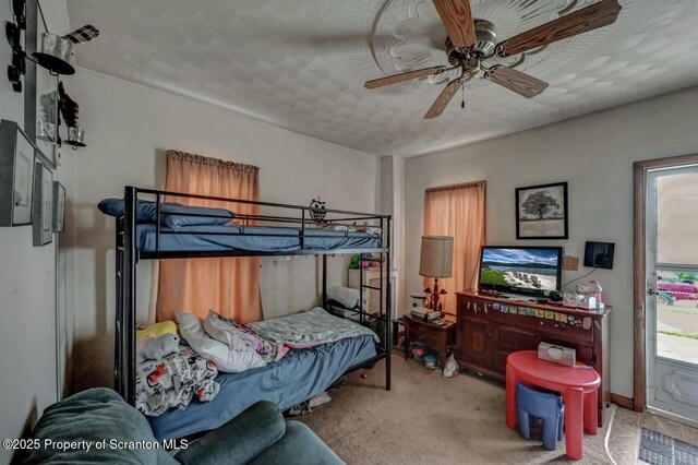 219 N Sumner Ave, Scranton, PA 18504 - carpeted bedroom with a ceiling fan
