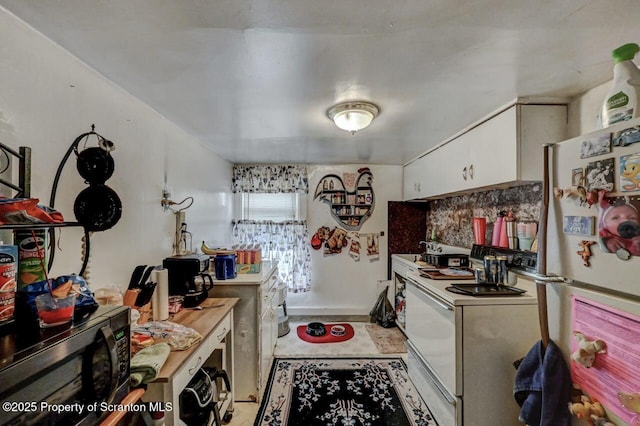 219 N Sumner Ave, Scranton, PA 18504 - kitchen featuring white appliances, white cabinetry, and light countertops