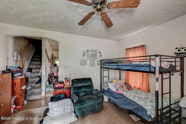 219 N Sumner Ave, Scranton, PA 18504 - bedroom featuring arched walkways and a ceiling fan