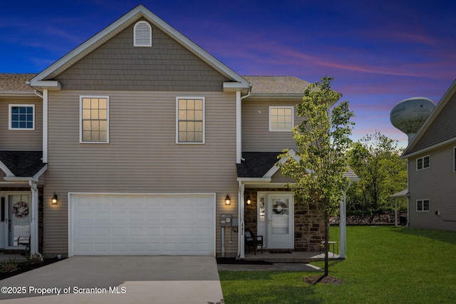 442 Shadow Wood Cir, Archbald, PA 18403 - view of property featuring concrete driveway, a yard, a garage, and a shingled roof