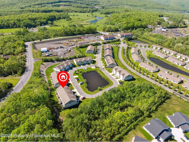 442 Shadow Wood Cir, Archbald, PA 18403 - aerial perspective of suburban area with a nearby body of water and a heavily wooded area