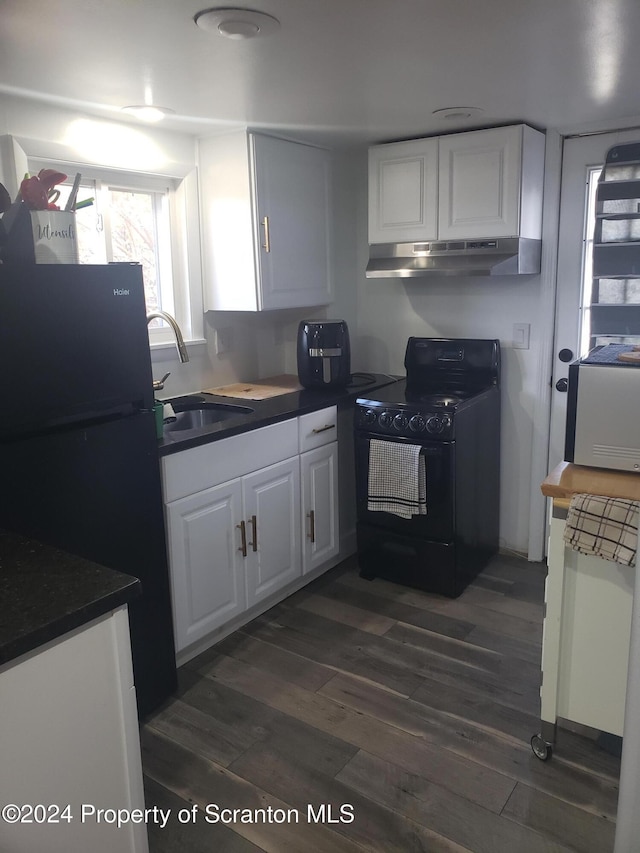 kitchen featuring white cabinets, dark hardwood / wood-style flooring, sink, and black appliances