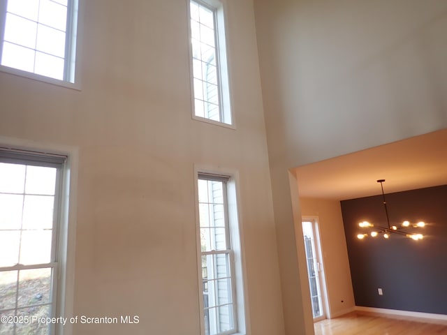 entryway with a towering ceiling