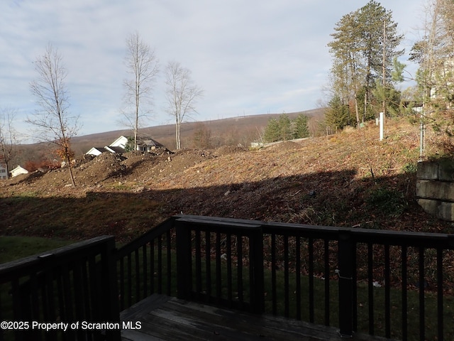 view of yard with a deck