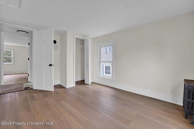 interior space with hardwood / wood-style flooring