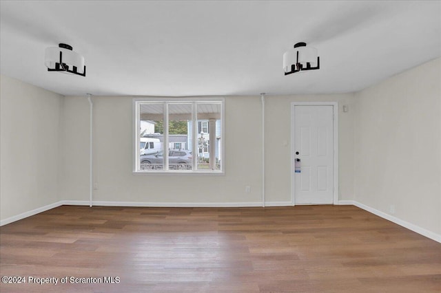 foyer entrance with wood-type flooring