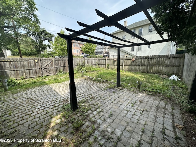 1518 Vine St, Scranton, PA 18510 - fenced backyard featuring a patio area and a pergola