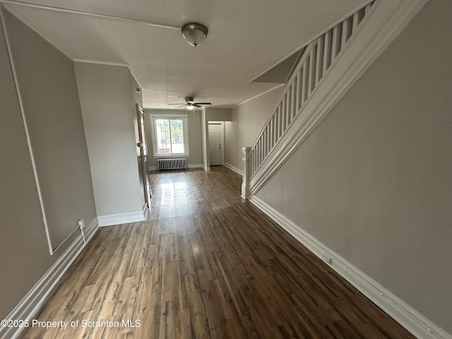 1132 Chestnut St, Allentown, PA 18109 - hall with radiator, wood finished floors, and stairs