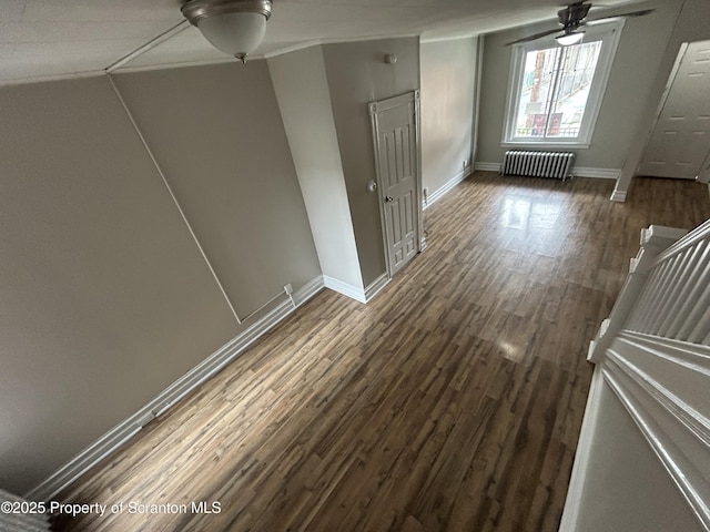 1132 Chestnut St, Allentown, PA 18109 - spare room featuring radiator, ceiling fan, wood finished floors, and ornamental molding