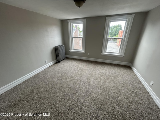 1132 Chestnut St, Allentown, PA 18109 - spare room featuring radiator and carpet
