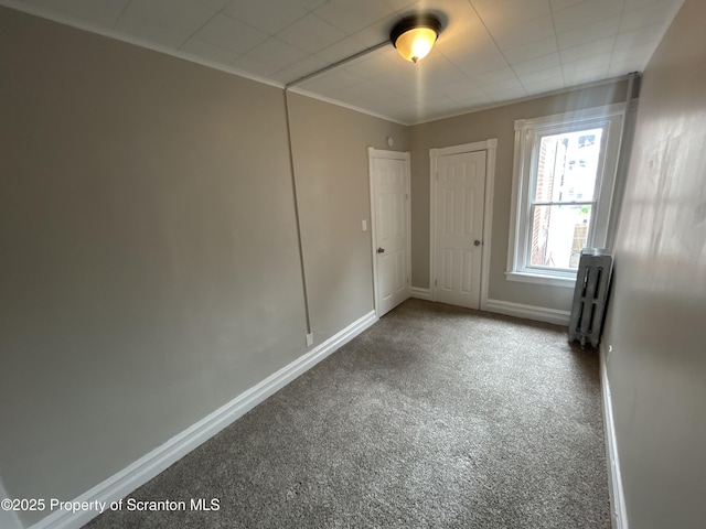 1132 Chestnut St, Allentown, PA 18109 - unfurnished room with radiator, carpet flooring, and ornamental molding