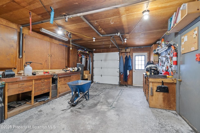 garage featuring a workshop area