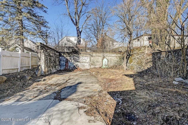 view of yard with fence