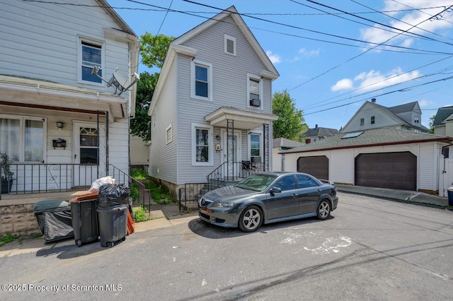 7 Oakwood Pl, Scranton, PA 18510 - view of front facade featuring a garage and an outbuilding