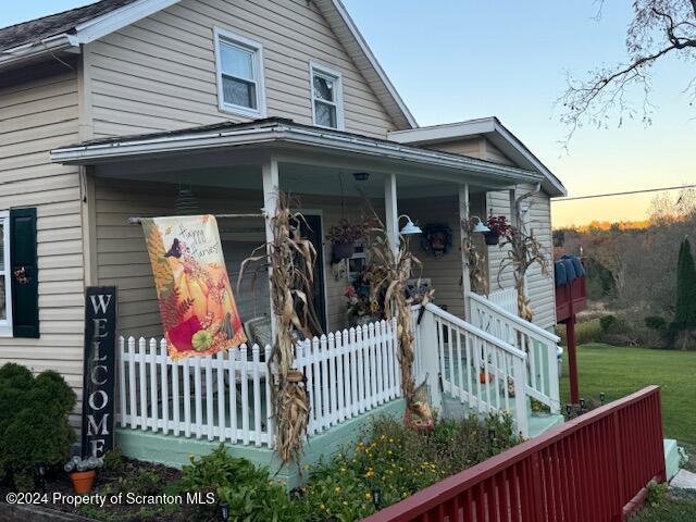 view of front of house featuring covered porch